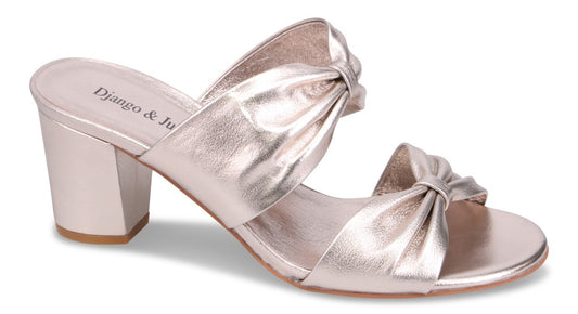 Rose gold mule sandal with a block heel and knotted straps; "Django & Juliette" printed on insole