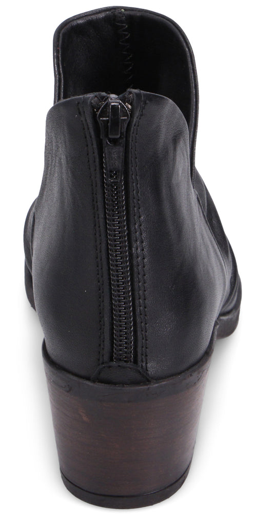 Back of black ankle boot with a heel and zipper closure.