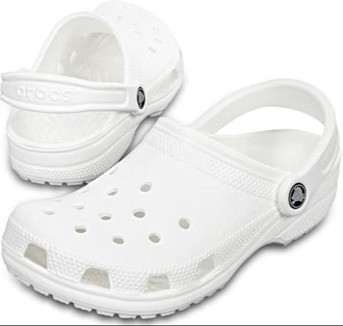 Pair of white clog shoes with heel straps and ventilation holes.