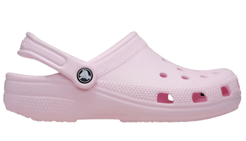 Side view of a pink clog-style shoe with ventilation holes and a pivoting back strap.