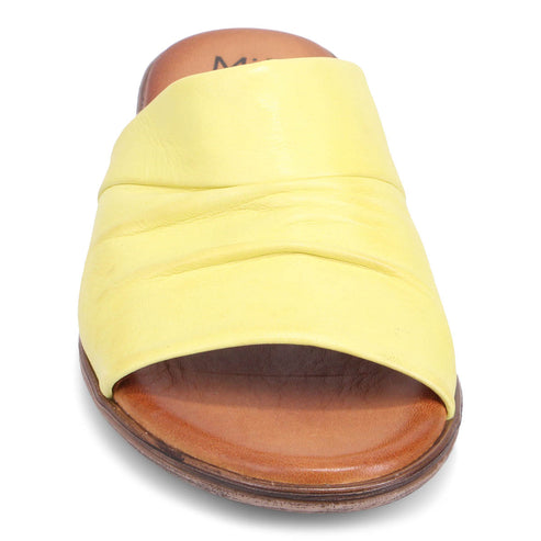 Yellow slide sandal with a gathered leather strap and a brown sole.