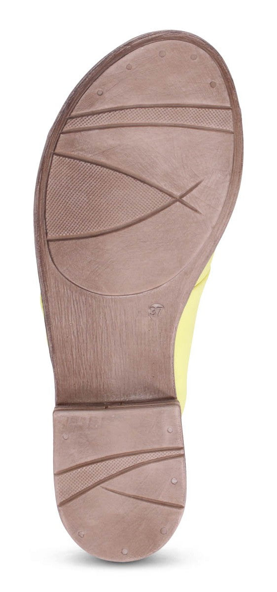 Sole of a shoe with a dark brown, textured design.