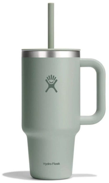 Tall, green water bottle with handle and straw, featuring a hand logo.
