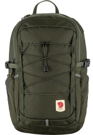 Forest green backpack with criss-cross cord detail and logo patch.