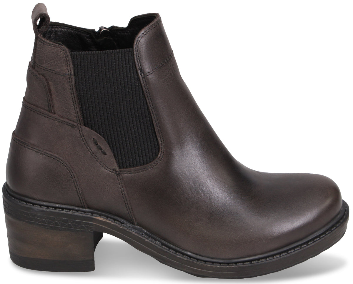 A dark brown leather ankle boot with a low block heel, a rounded toe, and black elastic side panels.