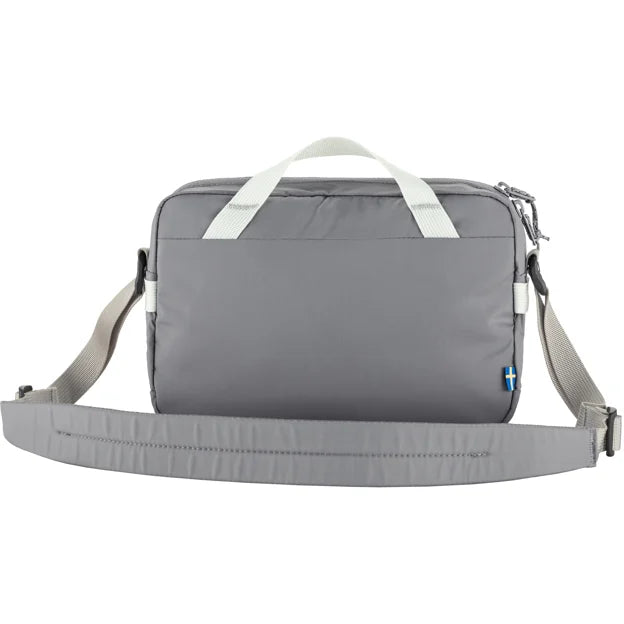 Gray messenger bag with white straps.