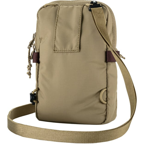 Tan crossbody bag with adjustable strap and brown accents.