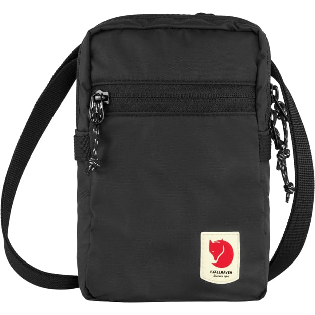 Black rectangular crossbody bag with a front zipper pocket and logo patch at the bottom.