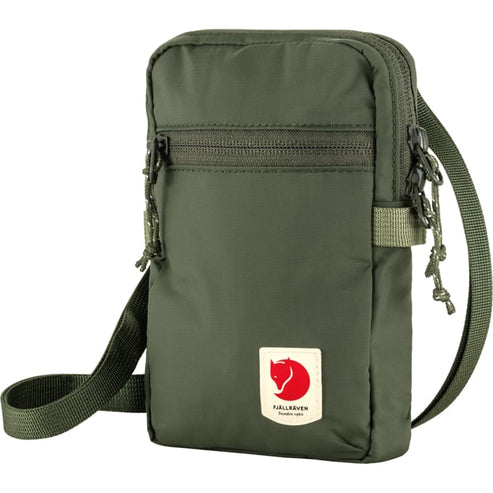Olive green vertical bag with zipper and strap; a white rectangle with a red fox illustration and text at the bottom.