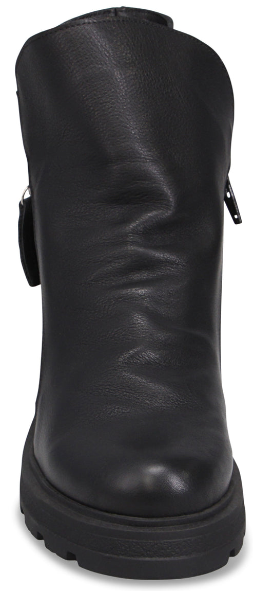 A black ankle boot with a smooth, matte finish, a side zipper, and a chunky, thick lugged sole viewed from the front.