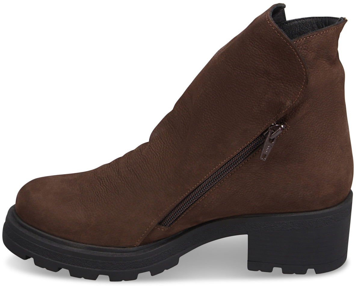 A brown suede ankle boot with a side zipper and a chunky black lug sole.
