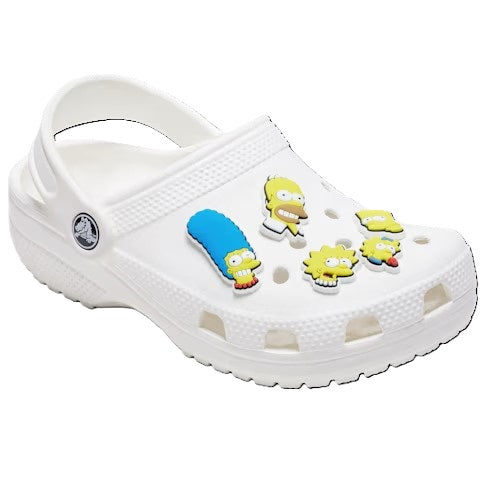 White clog shoe with cartoon character charms.