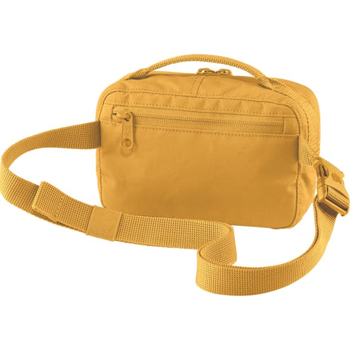 Mustard yellow belt bag with adjustable strap, zipper pocket, and top handle.