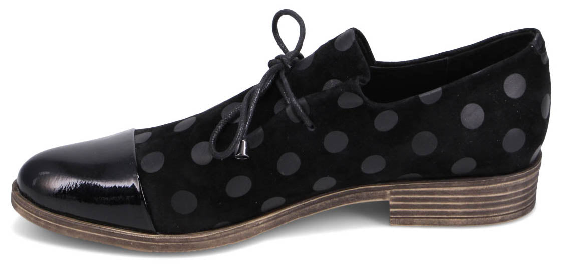 Black polka dot dress shoe with a patent leather toe.