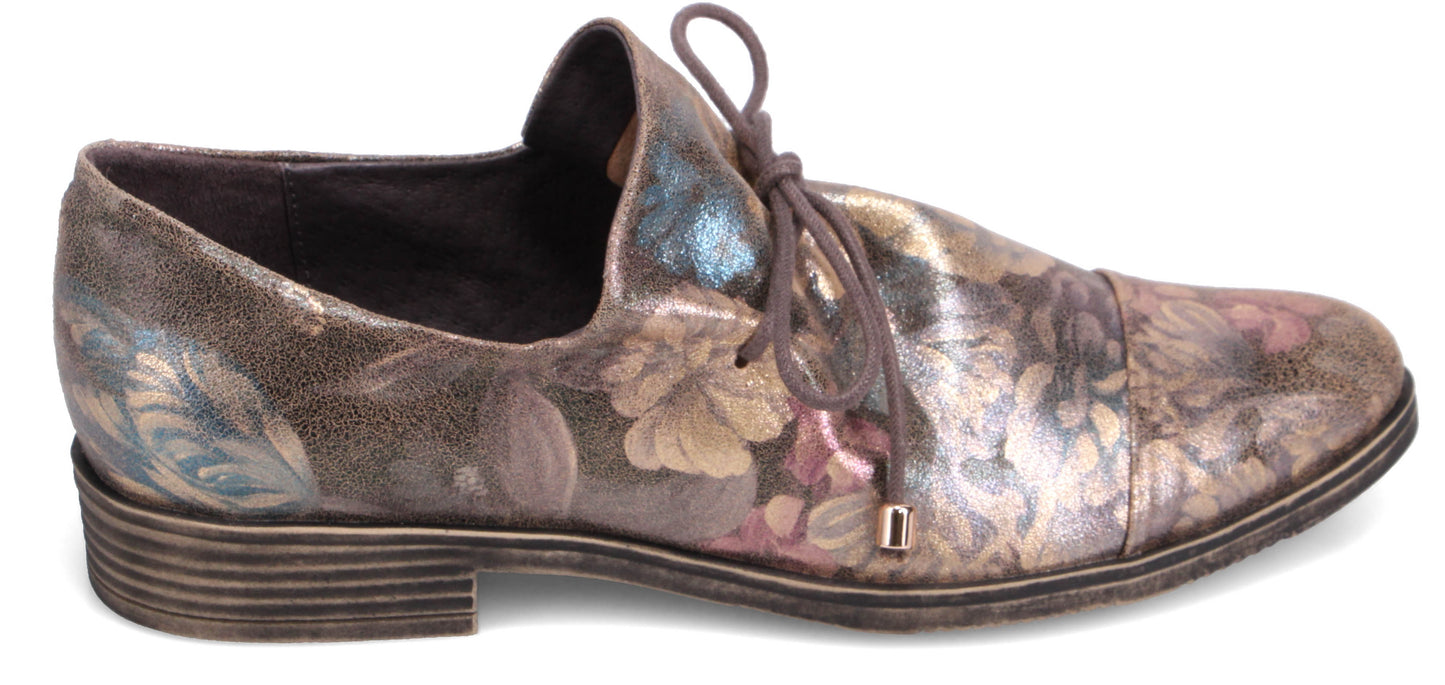 Floral patterned lace-up shoe.