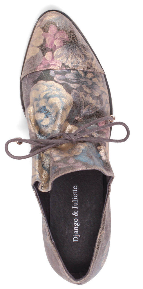 Top-down view of a gray floral shoe with tied laces.