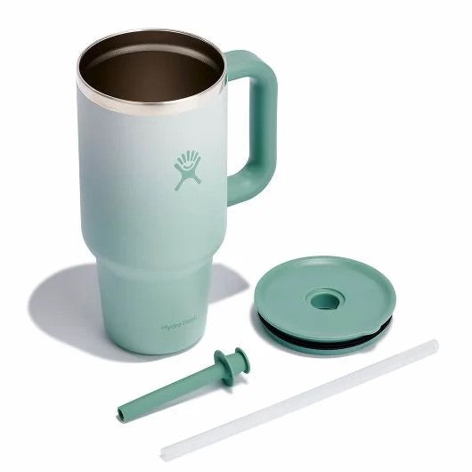Light blue insulated mug with handle, lid, silicone stopper, and straw.