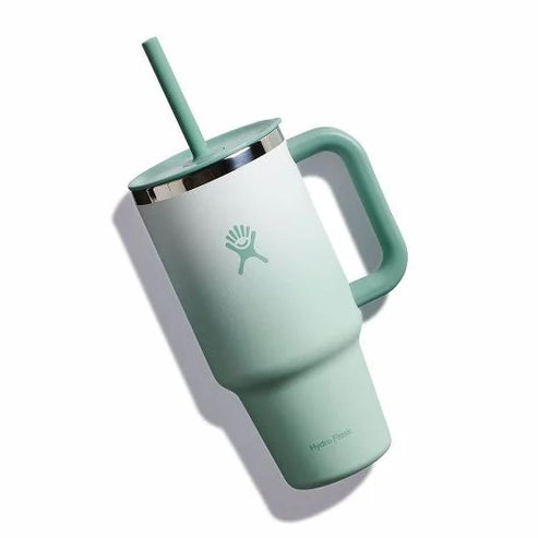 Green ombre tumbler with handle and straw.