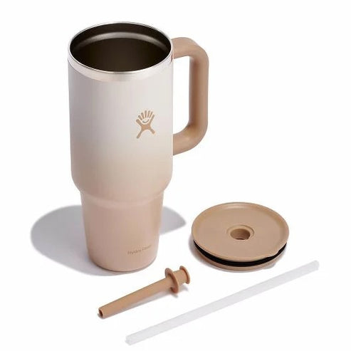 Insulated mug with handle, lid, straw, and straw cleaner.