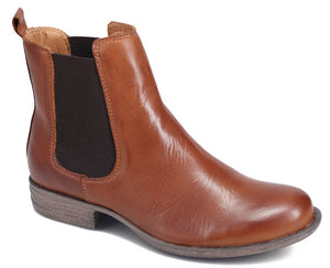 A tan leather Chelsea boot with elastic side panels and a low heel.