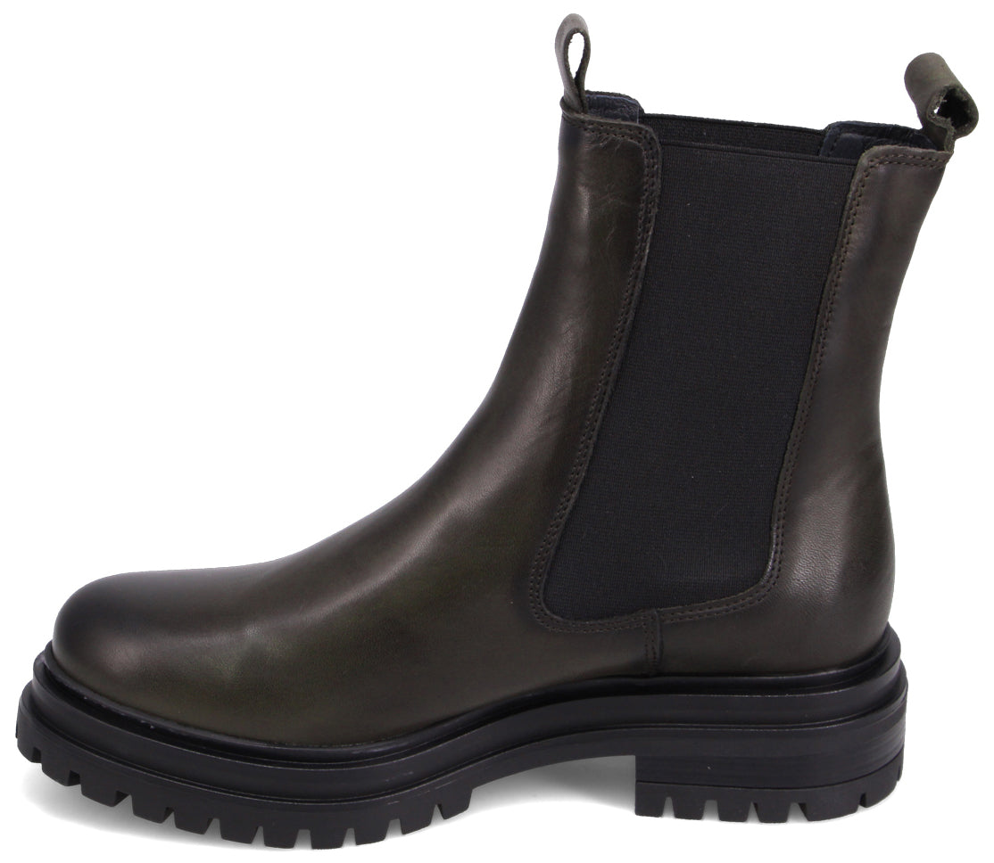Olive green Chelsea boot with a chunky black sole and heel.