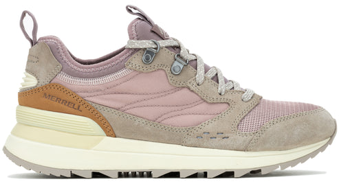 Side view of an athletic shoe featuring a cream-colored sole, lavender fabric upper and taupe suede overlays, with metal lace eyelets and "MERRELL" branding on the heel.