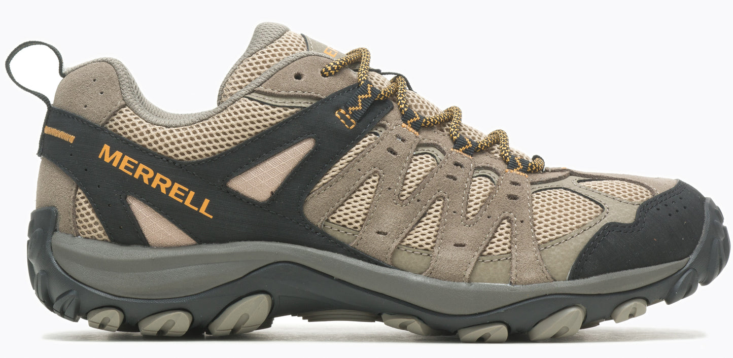 A tan trail shoe with black accents and brown laces.