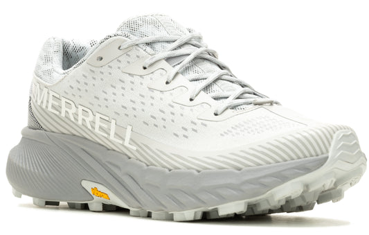 A white running shoe with a gray ridged sole.