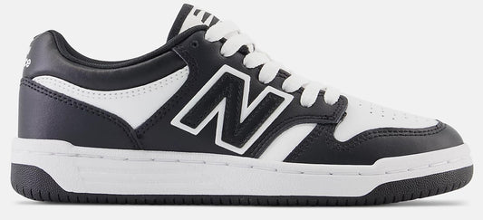 A black and white New Balance sneaker with white laces.