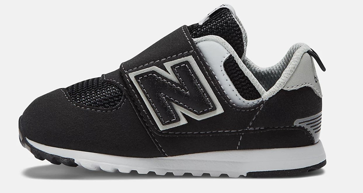 Black toddler shoe with white midsole, velcro strap and large white N.