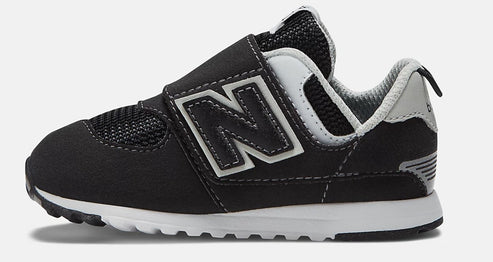 Black toddler shoe with white midsole, velcro strap and large white N.