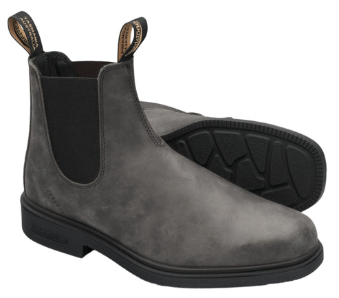 Pair of gray leather Chelsea boots with elastic sides and black soles.