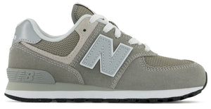 Gray sneaker with white laces and a large "N" on the side.