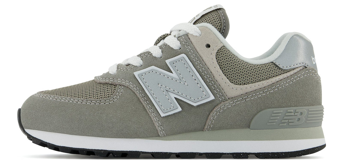 A gray New Balance sneaker with a white 'N' logo and white laces.