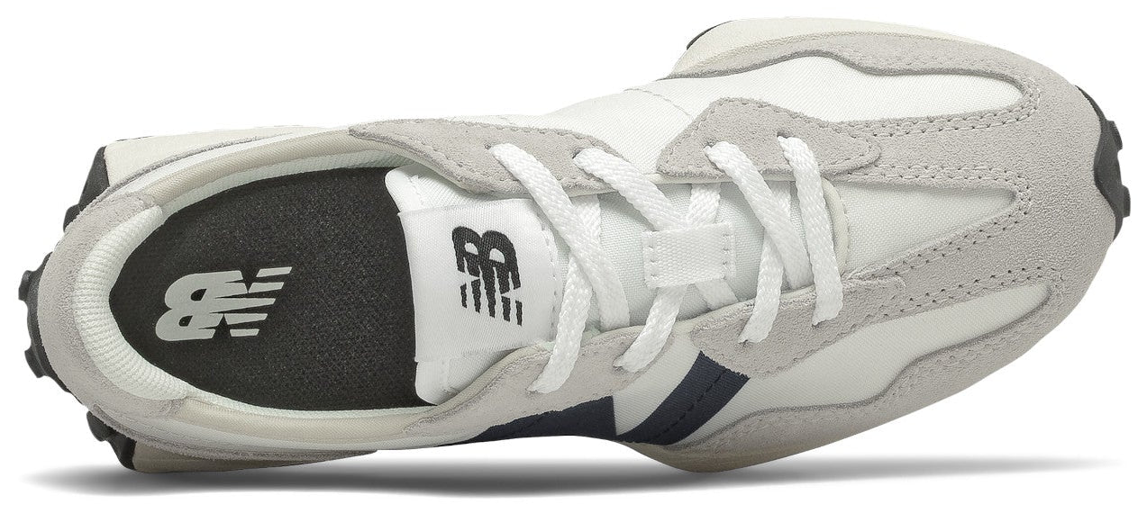 A New Balance sneaker featuring white, gray, and dark blue color scheme, with the 'NB' logo visible.