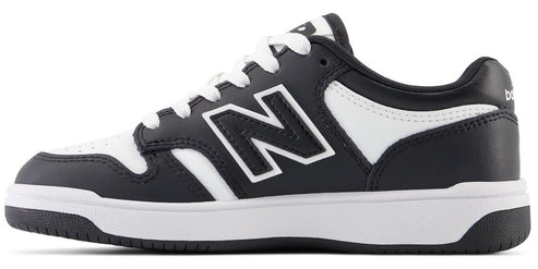 Black and white low-top sneaker with a large 'N' on the side.
