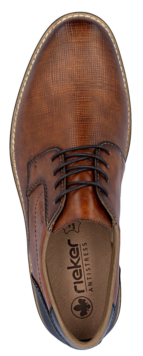 Brown leather dress shoe with black laces and dark leather heel.
