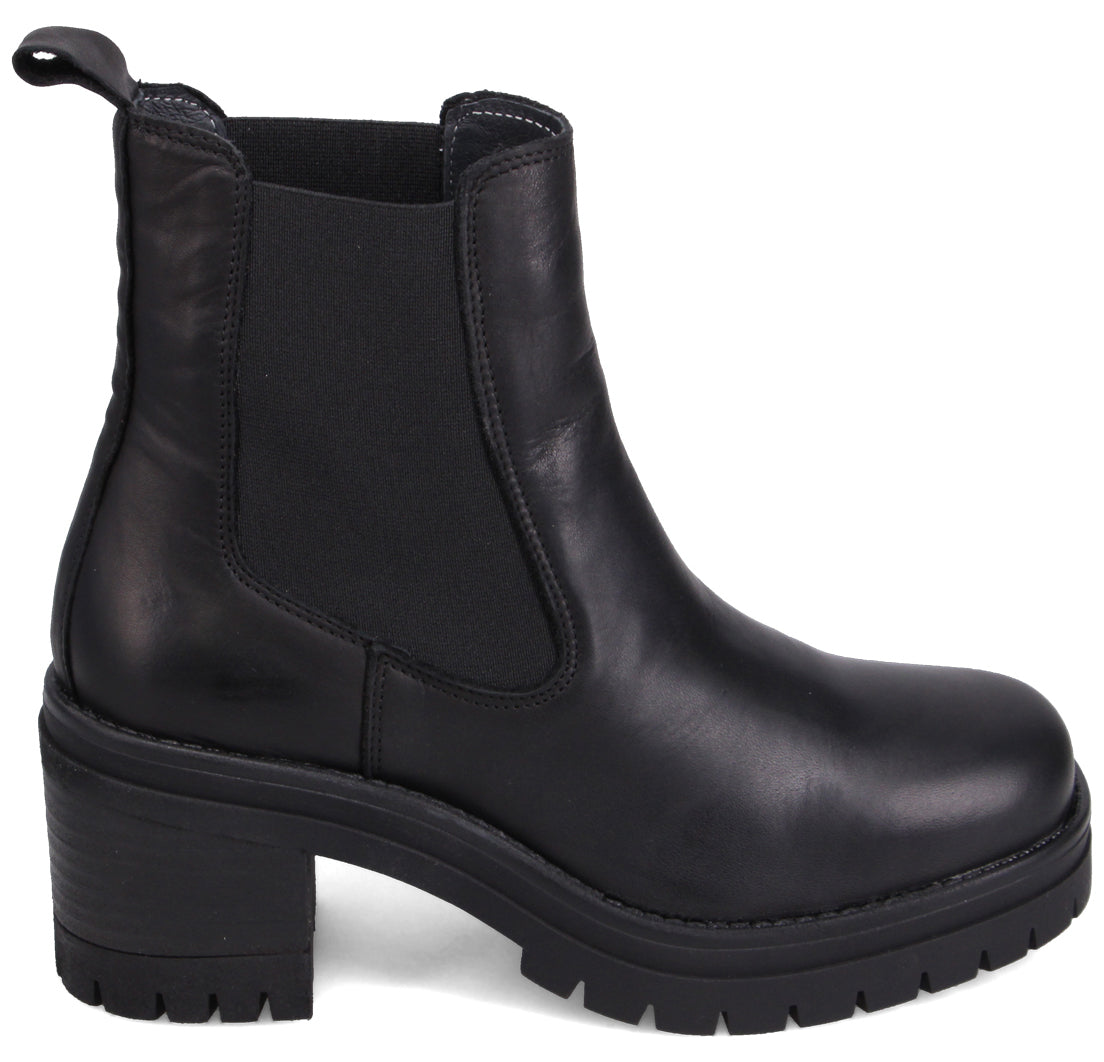Black Chelsea boot with a block heel and lug sole.