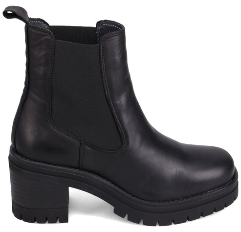 Black Chelsea boot with a block heel and lug sole.