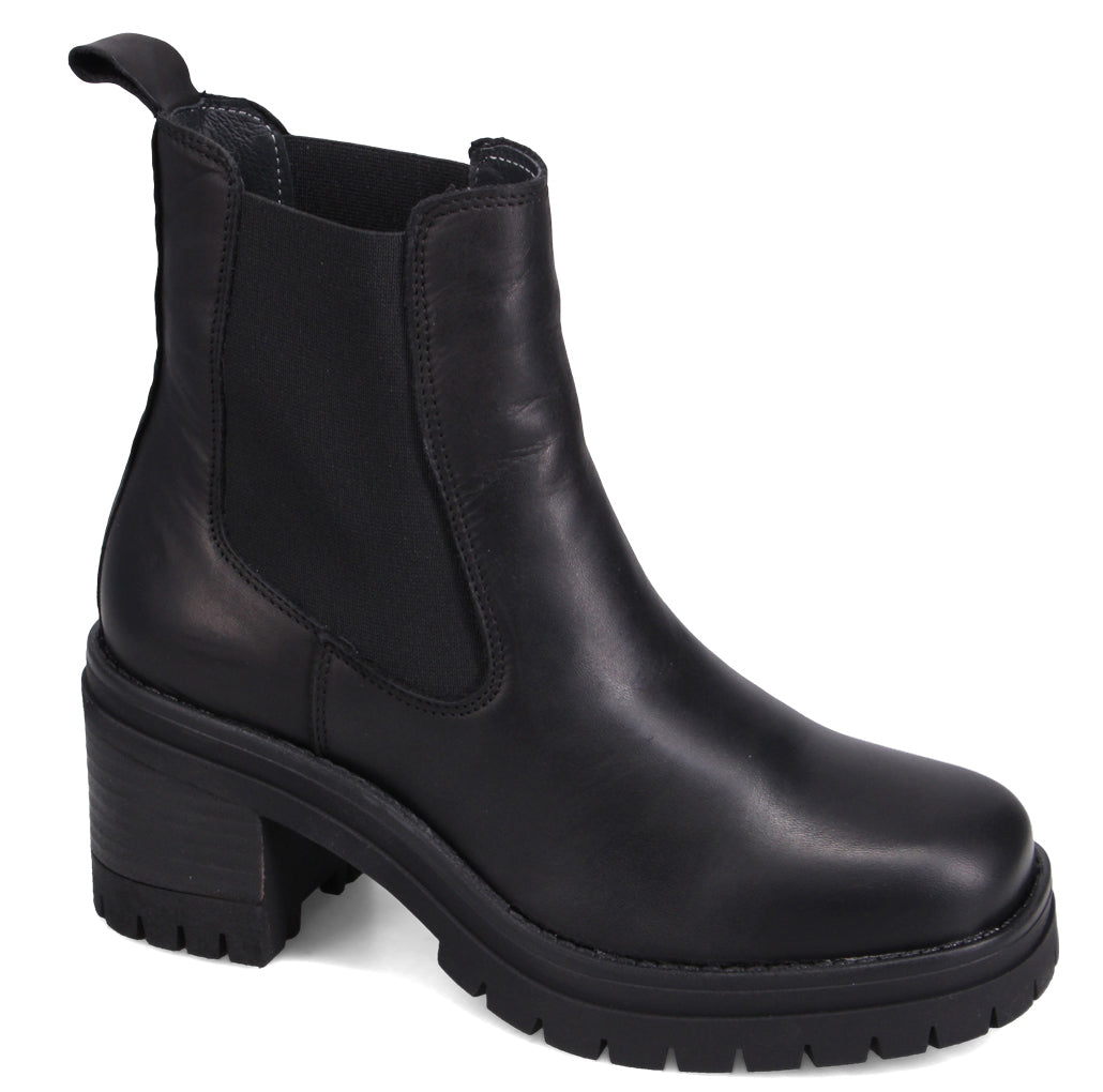 Black leather Chelsea boot with thick lug sole and stacked heel.