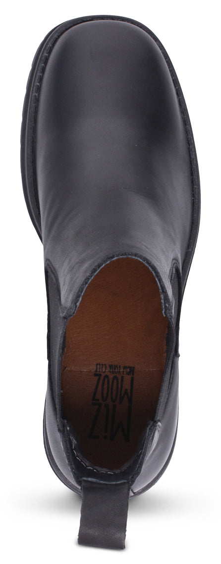Top-down view of a black leather Chelsea boot with a pull tab.