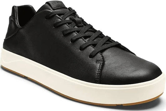 Black leather sneaker with white sole and black laces.