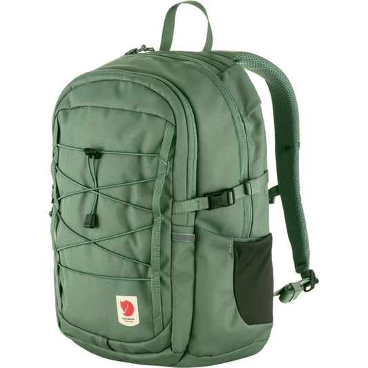 Green backpack with side pocket, black cord detail, padded straps and top handle.