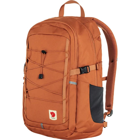 Orange backpack with black bungee cords and a side pocket.
