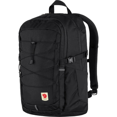 Black backpack with front straps and a small logo at the bottom.
