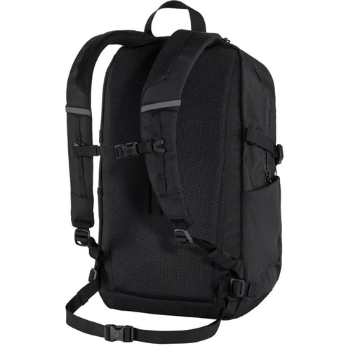 Black backpack with padded shoulder straps and adjustable chest and waist straps.