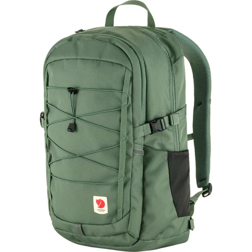 Green backpack with bungee cord, side pockets, top handle and shoulder straps.