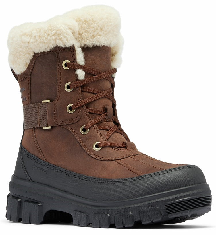 Brown snow boot with white fur trim and black sole.