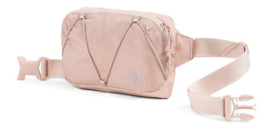 A pale pink bag with a strap and buckle.