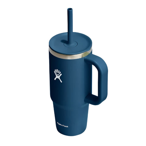 Blue Hydro Flask tumbler with handle and straw.
